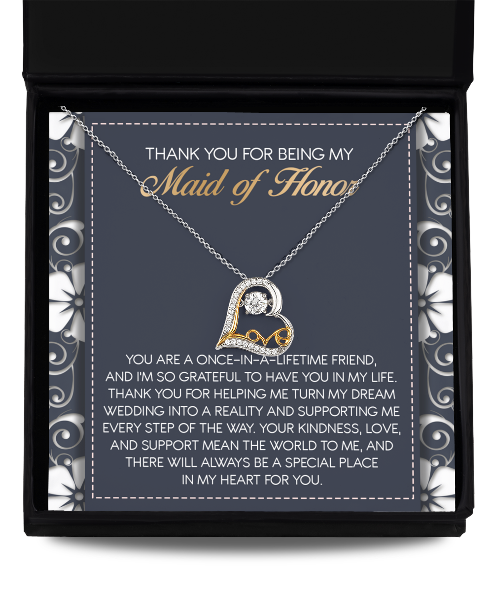 The "To Maid of Honor-World To Me - Love Dancing Necklace," a sterling silver heart-shaped pendant, sits in a black box above a message expressing gratitude to the Maid of Honor.