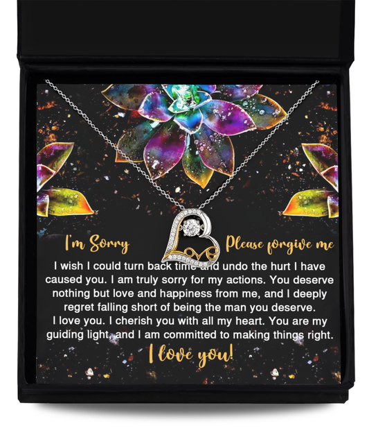 The Sorry-All My Heart - Love Dancing Necklace is a 14k gold necklace presented in a box accompanied by a heartfelt apology message. The message conveys regret for causing hurt and expresses a deep commitment to love and happiness, ending with "I love you!" and a request for forgiveness.