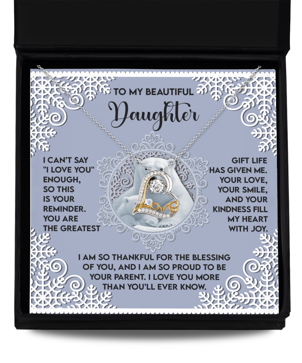 The Daughter-Fill My Heart - Love Dancing Necklace features a heart-shaped sterling silver pendant on a card with a heartfelt message to a daughter. It is elegantly rhodium plated and presented in a black box with a decorative white border.