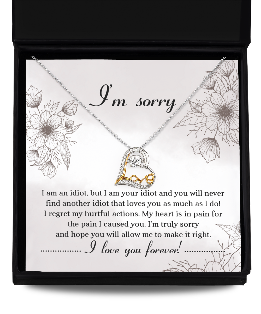 The Sorry-For The Pain - Love Dancing Necklace, a heart-shaped, 14k gold-plated piece, comes with a heartfelt apology note expressing deep regret for causing pain and pleading for forgiveness. The message concludes with "I love you forever.