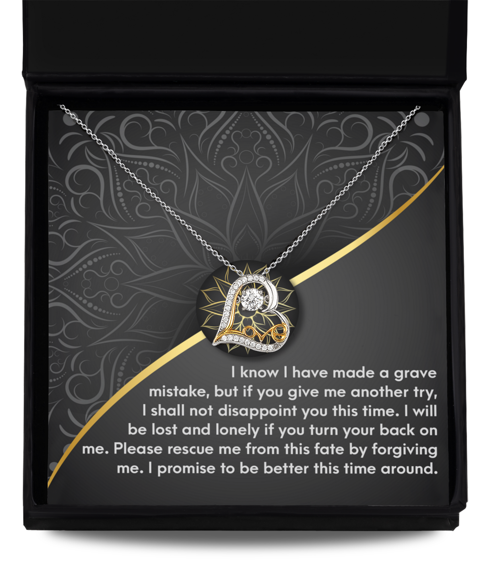 The Sorry-Turn Your Back - Love Dancing Necklace, a heart-shaped pendant crafted from .925 Sterling Silver, comes elegantly presented in a black box with a heartfelt message expressing regret and a plea for forgiveness.