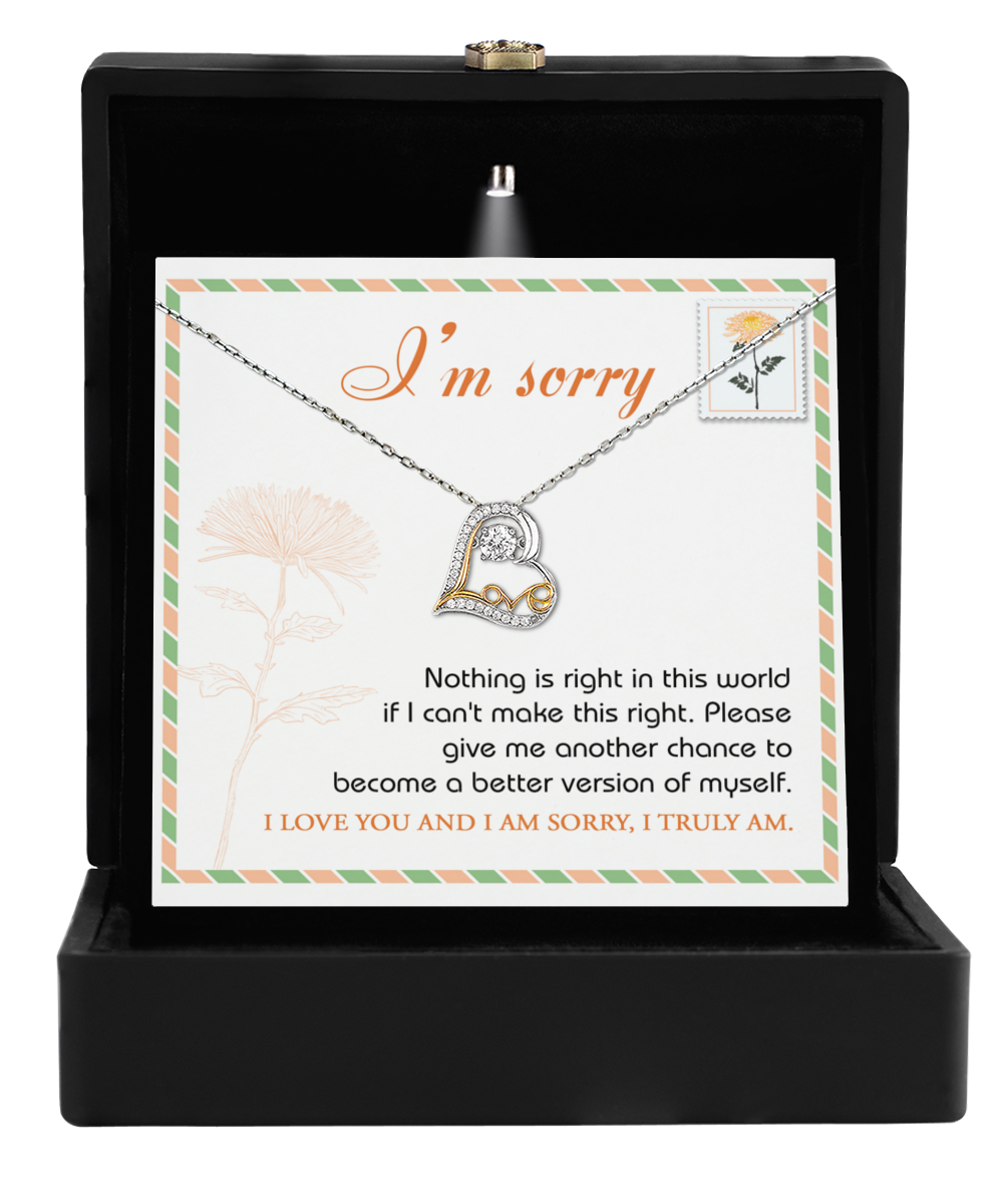 The Sorry-Another Chance - Love Dancing Necklace, which showcases a heart-shaped pendant, is delivered in a black box accompanied by an apology card saying, "I'm sorry. Nothing is right in this world if I can't make this right. Please give me another chance to become a better version of myself.