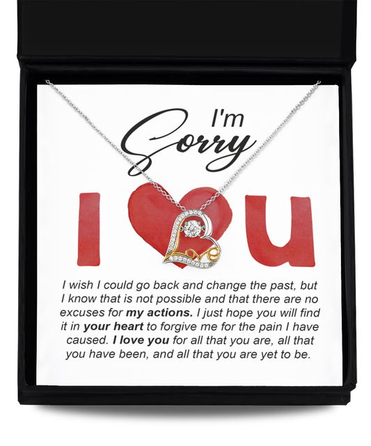 A "Sorry" note paired with the Sorry-Change The Past - Love Dancing Necklace, which features a .925 Sterling Silver heart pendant, is placed inside a box that contains an apology message.