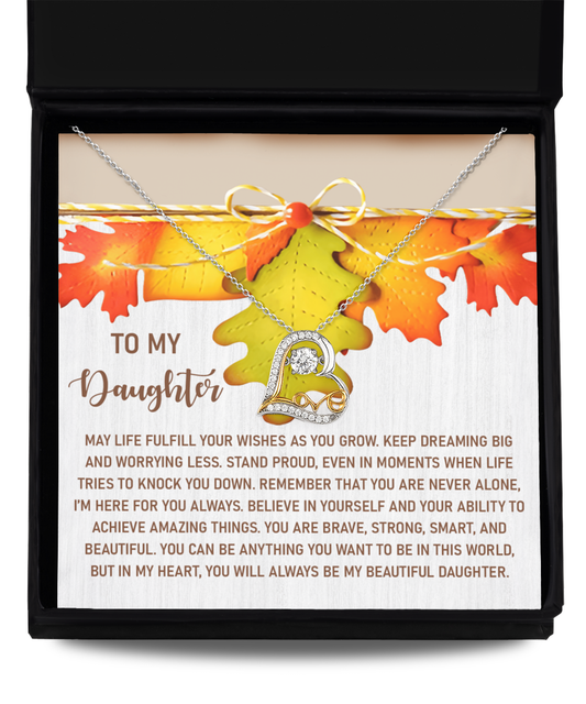 The "Daughter-For You Always - Love Dancing Necklace" features a heart-shaped pendant in a box, crafted from sterling silver. The backdrop includes autumn leaves and a heartfelt message written for a daughter.