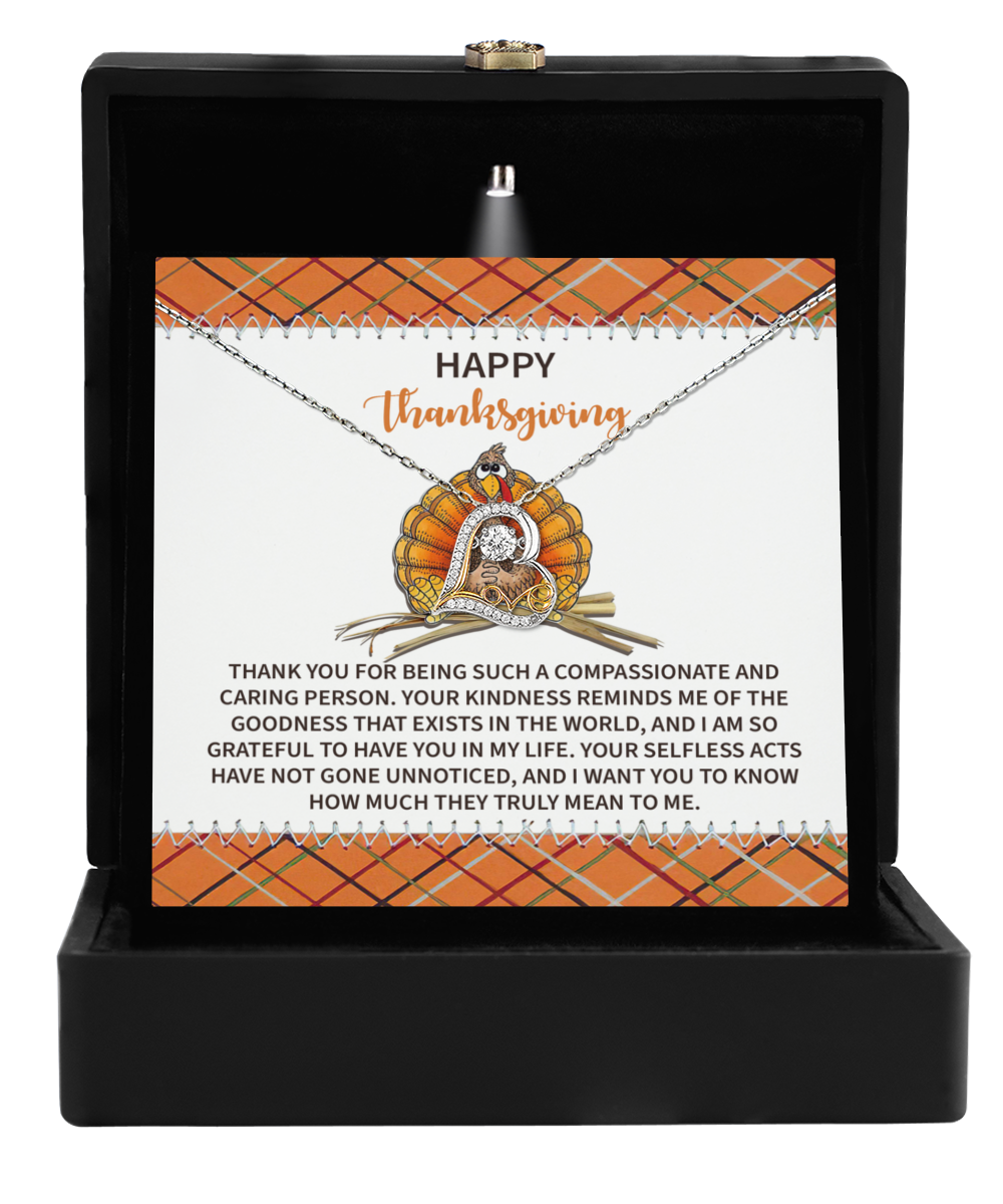 A Jewelry gift box containing a Thanksgiving card and featuring the "Thanksgiving-In My Life - Love Dancing Necklace," which is embellished with a heart pendant in sterling silver and autumn-themed designs.