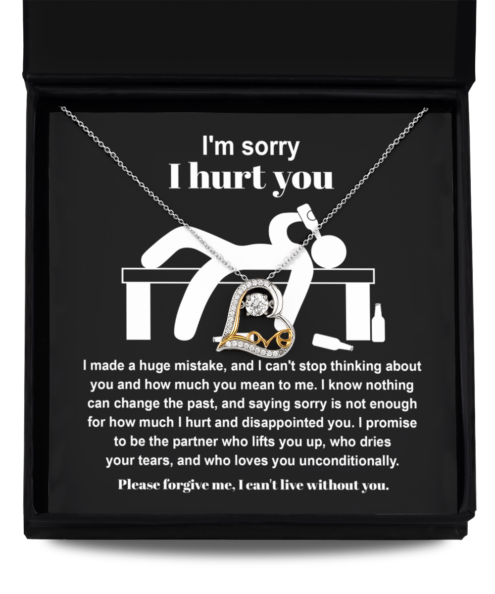 The Sorry-Change The Past 2 - Love Dancing Necklace with a heartfelt message reads: "I'm sorry I hurt you. I made a huge mistake. Please forgive me, I can't live without you." The sterling silver necklace features a pendant of a figure holding a heart.