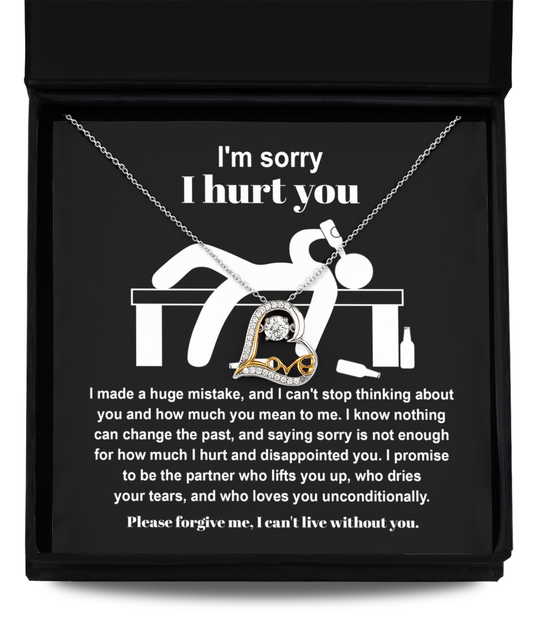 The Sorry-Change The Past 2 - Love Dancing Necklace with a heartfelt message reads: "I'm sorry I hurt you. I made a huge mistake. Please forgive me, I can't live without you." The sterling silver necklace features a pendant of a figure holding a heart.