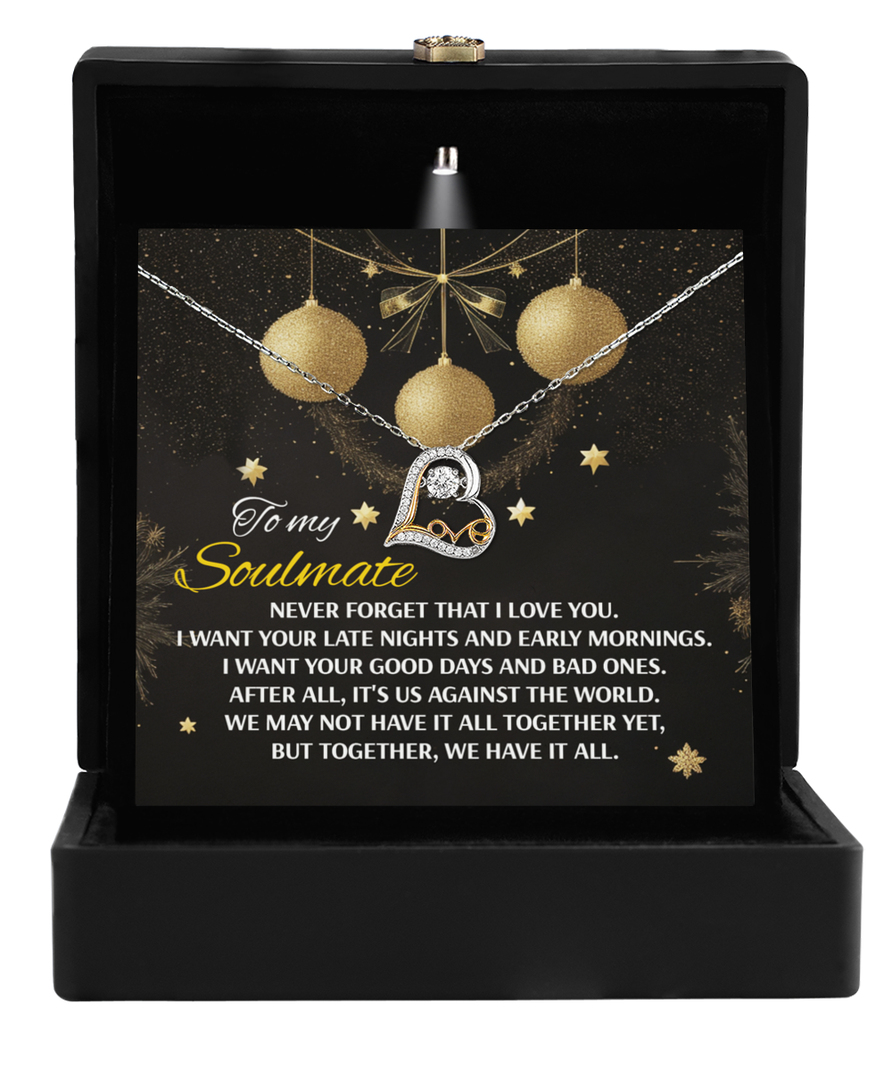 The Soulmate-Have It All- Love Dancing Necklace, showcasing a heart pendant crafted in 14k gold, is beautifully presented in a black box with a heartfelt message about love and companionship.