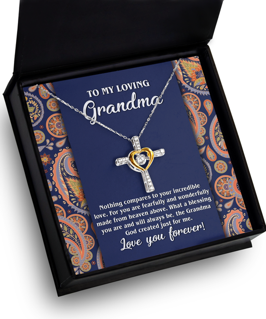 A heart-shaped personalized jewelry pendant with a "To Grandma, Just For Me" - Cross Dancing Necklace inside a gift box, accompanied by a message for a grandmother from Gearbubble.