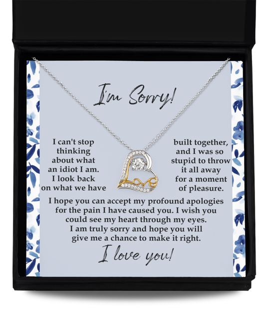 The Sorry-Through My Eyes - Love Dancing Necklace features a heart-shaped pendant, available in 14k gold or Sterling Silver, and comes on a card that reads, "I'm Sorry!" followed by a heartfelt apology message and concluding with "I love you.