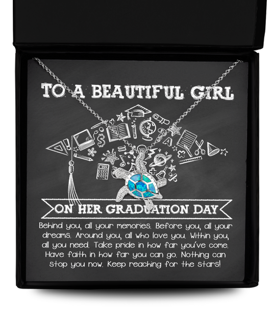 Happy Graduation, All Your Dreams - Opal Turtle Necklace in a black box featuring an inspirational graduation message for a mom, decorated with chalk-style doodles and a blue gem pendant.