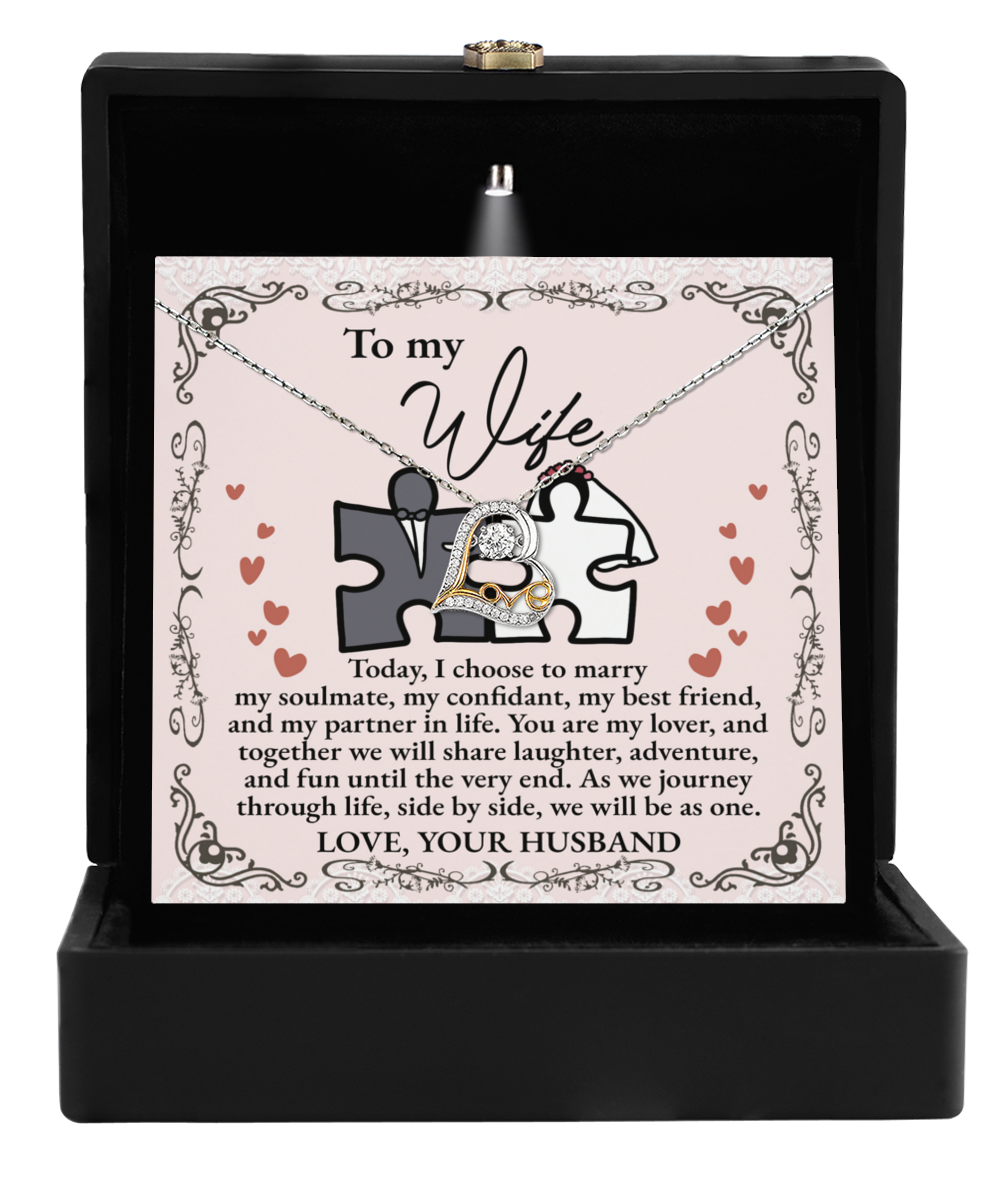 Gift your wife the "To Wife, Be As One - Love Dancing Necklace," which arrives in a stunning box accompanied by a heartfelt note addressed "To my Wife." With its delightful puzzle piece design, it conveys a loving message signed "Love, Your Husband.