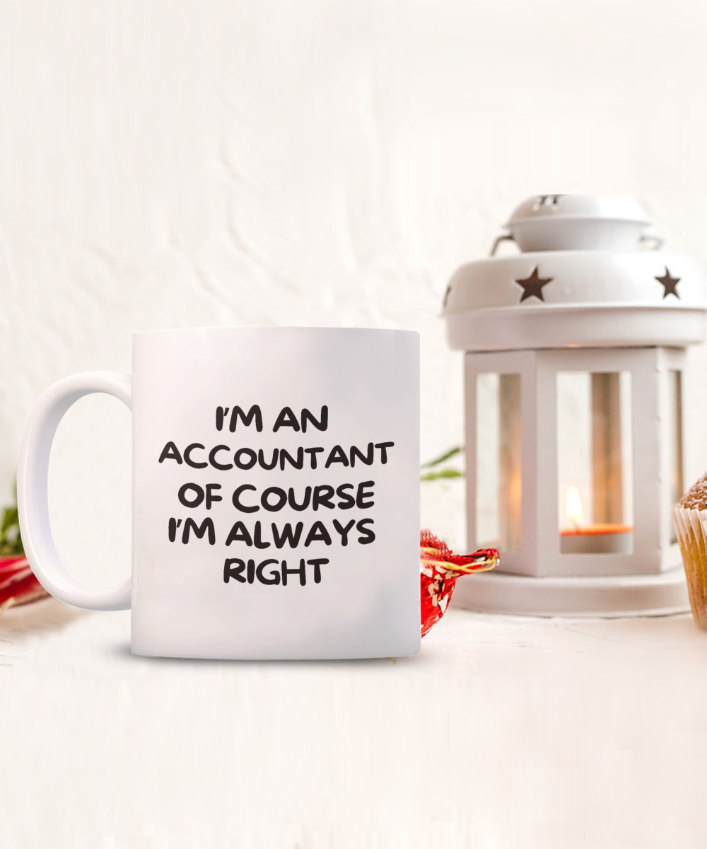 The "I'm An Accountant Of Course I'm Always Right" coffee mug, a perfect gift and appreciation cup for accountants, is placed next to a lit lantern adorned with star cutouts. Printed and shipped from the USA, this limited-time offer guarantees both quality and charm in one delightful package.