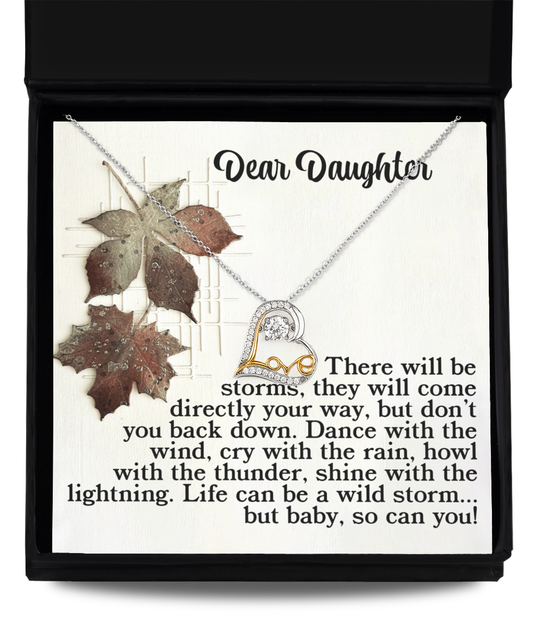 The Daughter-With The Thunder - Love Dancing Necklace, crafted in shining sterling silver, is nestled in a gift box with a heartfelt message to encourage your daughter to face life's storms with courage.