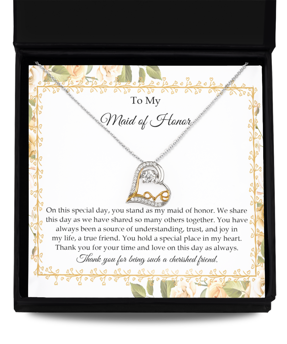 A "To Maid of Honor-Share This Day - Love Dancing Necklace" with a heart pendant sits in a jewelry box. Behind it is a note addressed to the Maid of Honor, expressing gratitude and appreciation for the friendship and support over the years.