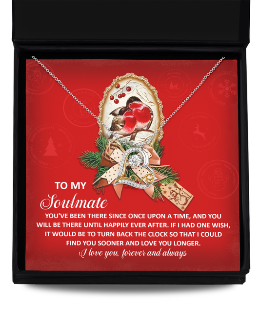 The Soulmate-Once Upon - Love Dancing Necklace, beautifully packaged with a message card showcasing two birds and holly on a deep red backdrop, is crafted in rhodium plated elegance. It's accompanied by a heartfelt message dedicated to a soulmate.