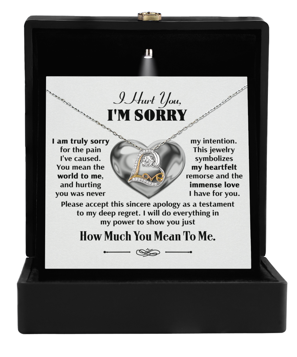 A Sorry-Sincere Apology - Love Dancing Necklace with a heart pendant in a black box. The message reads: "I hurt you. I'm sorry. I am truly sorry for the pain I've caused. You mean the world to me... How much you mean to me.