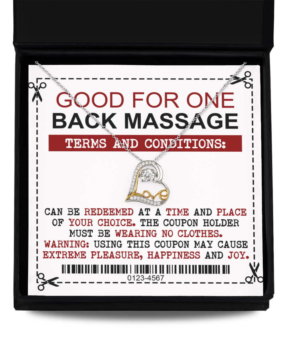 A coupon encased in a black box offers one Wife-Back Massage with specific terms, including the need for the coupon holder to be without clothes and noting the potential for extreme pleasure and joy. Perfectly pairs with our Love Dancing Necklace.