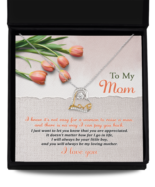 A gift box containing a To Mom, Go In Life - Love Dancing Necklace with a horseshoe pendant and a note to a mother with tulips, expressing maternal love and gratitude.