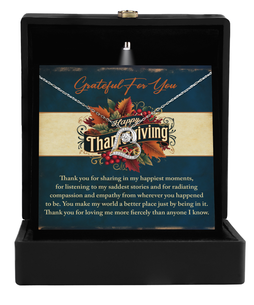 The Thanksgiving-Happiest Moments - Love Dancing Necklace, presented in a black box accompanied by a Thanksgiving card with a heartfelt message and autumn design elements, is crafted from sterling silver. This piece exudes elegance and charm, making it the ideal gift to convey gratitude and warmth this holiday season.