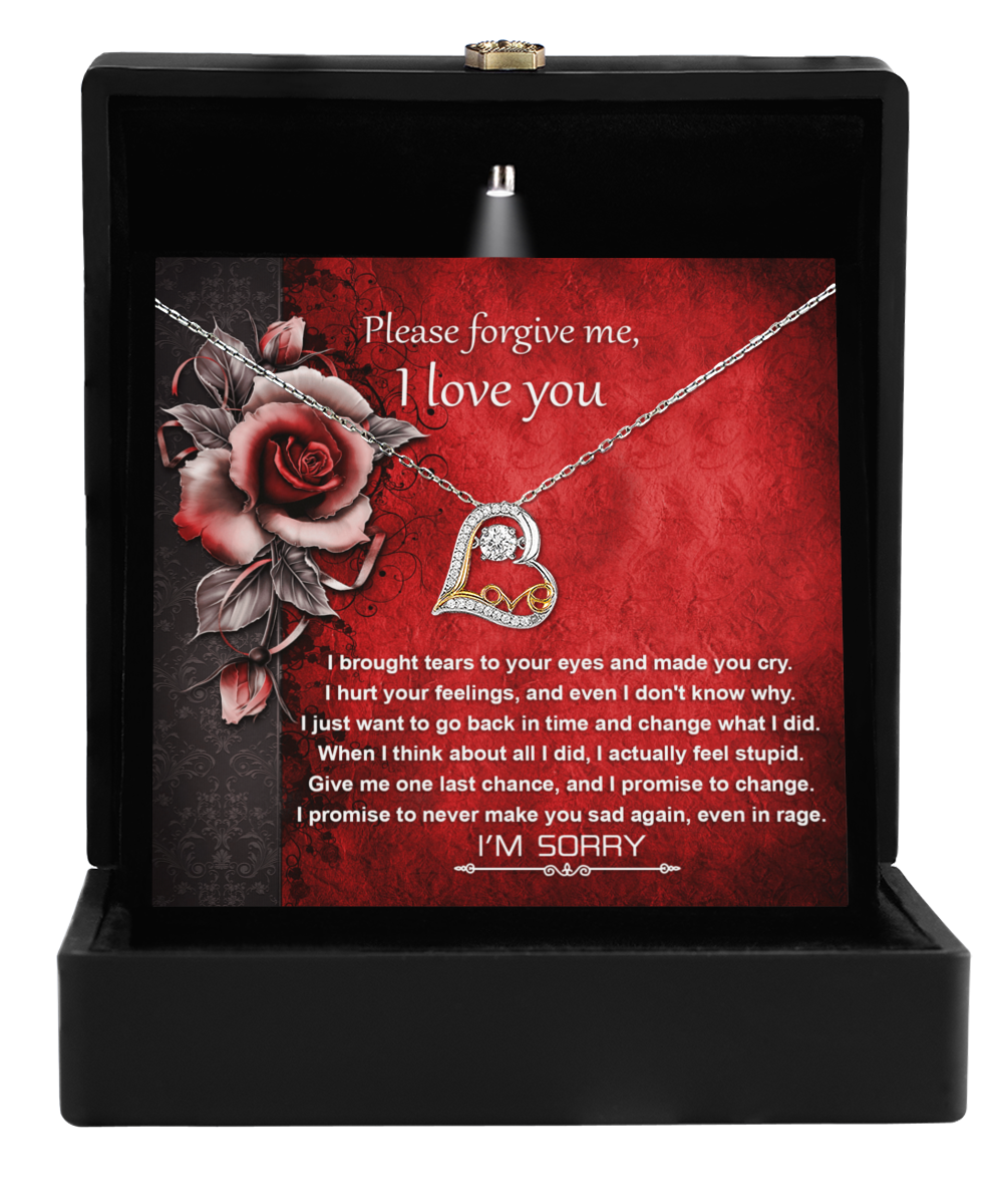 The Sorry-One Last Chance - Love Dancing Necklace is a heart-shaped pendant in a box with an apology and promise message, adorned with roses and the phrase "I'm Sorry," crafted in 14k gold.