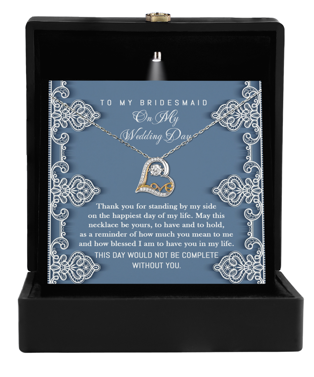 The Bridesmaid-By My Side - Love Dancing Necklace comes in a beautifully crafted jewelry box and includes a heartfelt card that reads, "To my bridesmaid on my wedding day. Thank you for standing by my side. This day would not be complete without you." It's the perfect gift to celebrate our special bond as bridesmaids.