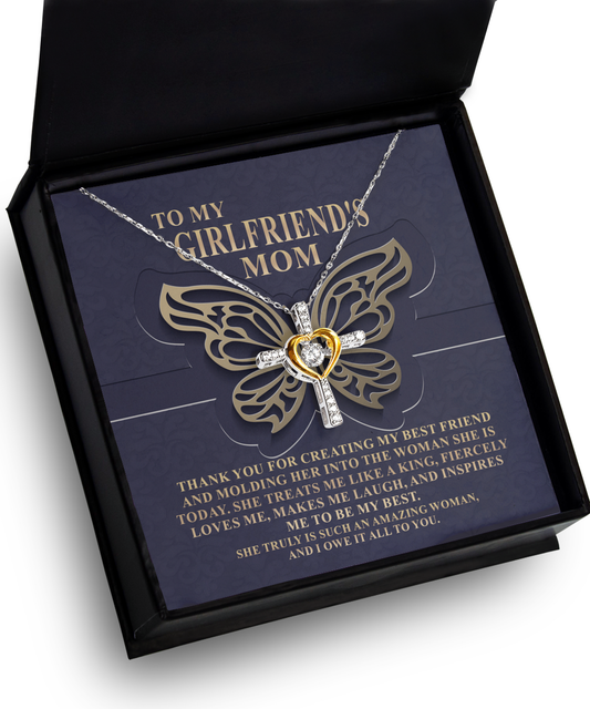 A Gearbubble Cross Dancing Necklace with a heart-shaped pendant displayed in a gift box as a special gift for mother, expressing appreciation for a girlfriend's mom.