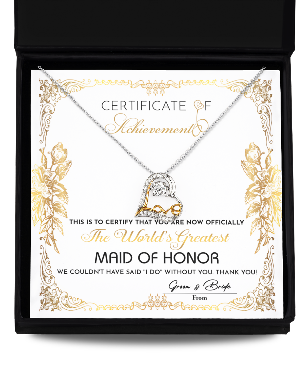 A "To Maid Of Honor-Certificate Of Achievement" titled "The World's Greatest Maid of Honor" in an ornate design, complemented by a heart-shaped Love Dancing Necklace in .925 Sterling Silver placed over it.