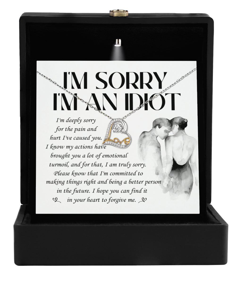 The Sorry-Emotional Turmoil - Love Dancing Necklace features a heart-shaped pendant in 14k gold, beautifully presented in a black box with an apology note.