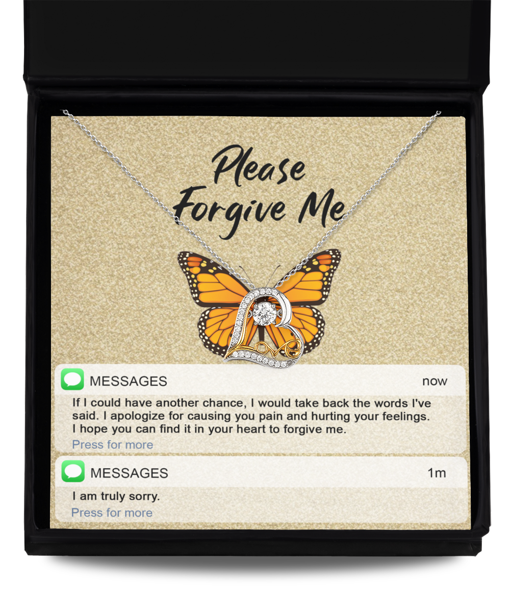 A Sterling Silver necklace named "Sorry-In Your Heart - Love Dancing Necklace" with a butterfly pendant sits inside a box with "Please Forgive Me" written above. Below are text messages saying, "I apologize for causing you pain," and, "I am truly sorry.