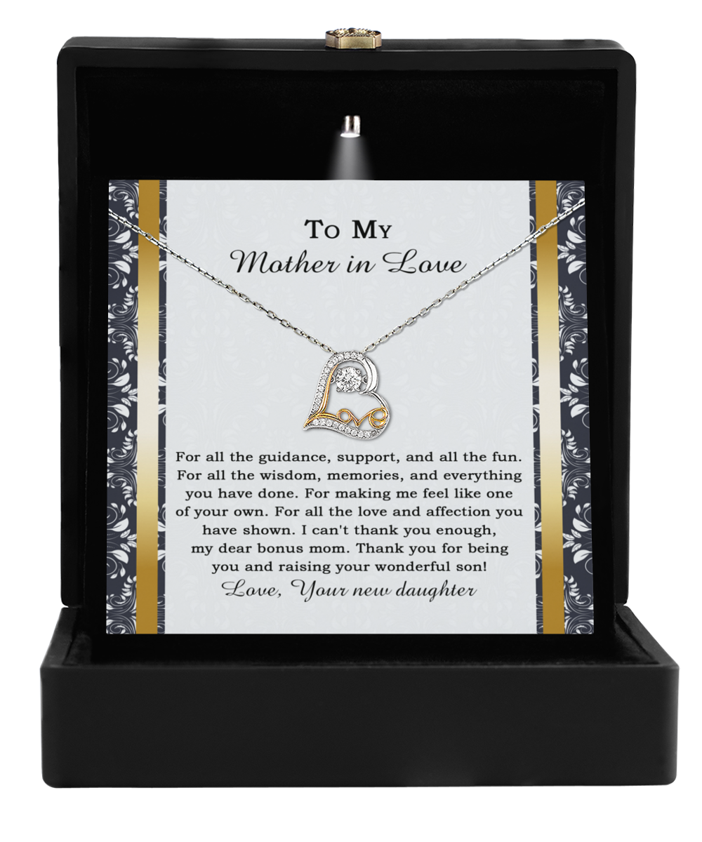 Presented in a sleek black box, the "To Mother-in-law-Of Your Own - Love Dancing Necklace" serves as a meaningful gift, including a touching message from a daughter. This product honors the special bond with one's mother-in-law by acknowledging her unwavering love, support, and the treasured memories they share.