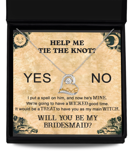 A Bridesmaid-My Main Witch - Love Dancing Necklace nestled inside a box adorned with the words, "HELP ME TIE THE KNOT? YES NO WILL YOU BE MY BRIDESMAID?" and text themed around witches and spells.