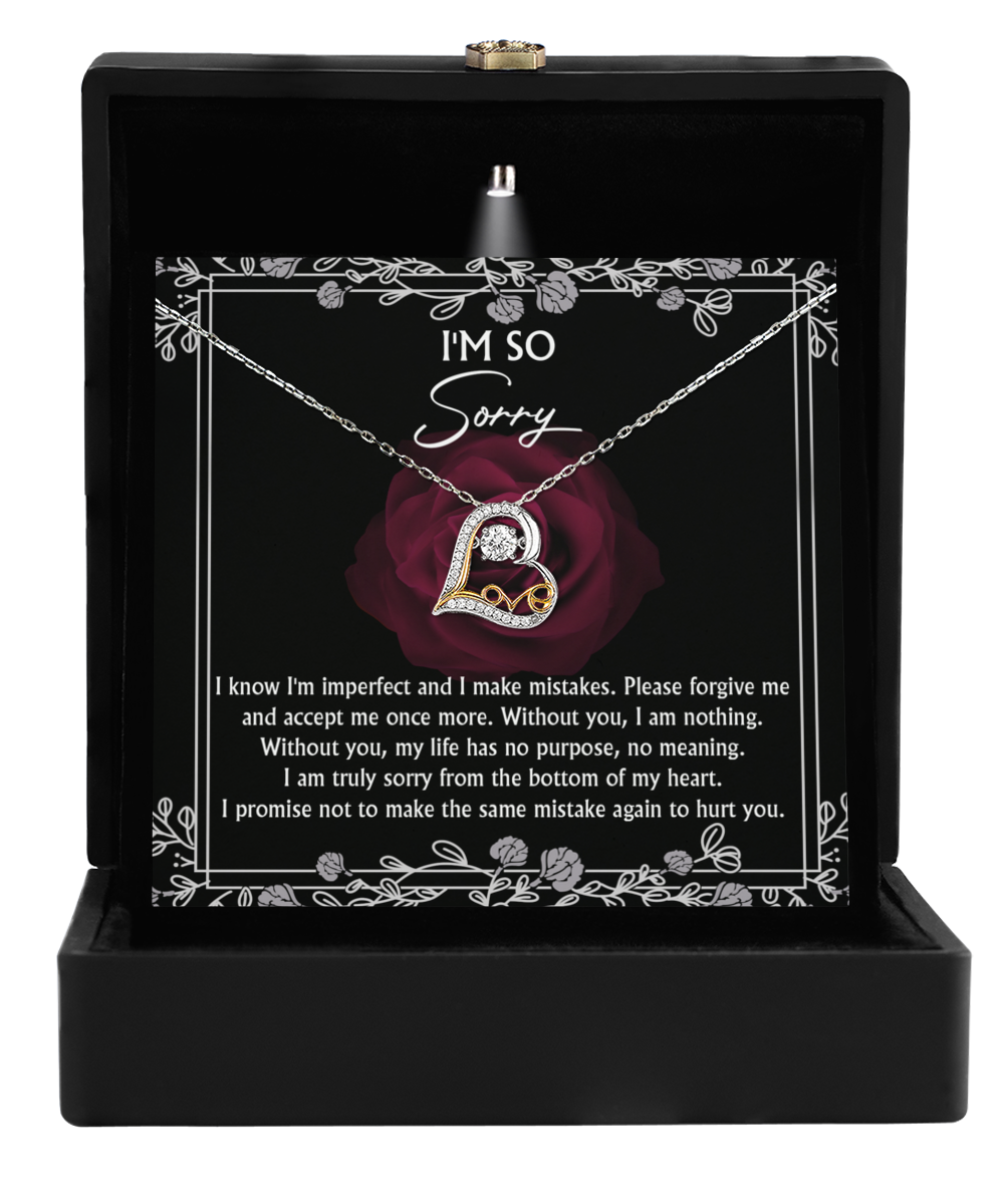 The Sorry-I Am Nothing - Love Dancing Necklace, a 14k gold piece featuring a heart pendant, is elegantly presented in a black box. When the lid is opened, it showcases an apology message embellished with roses, conveying heartfelt regret and a promise never to repeat the mistake.