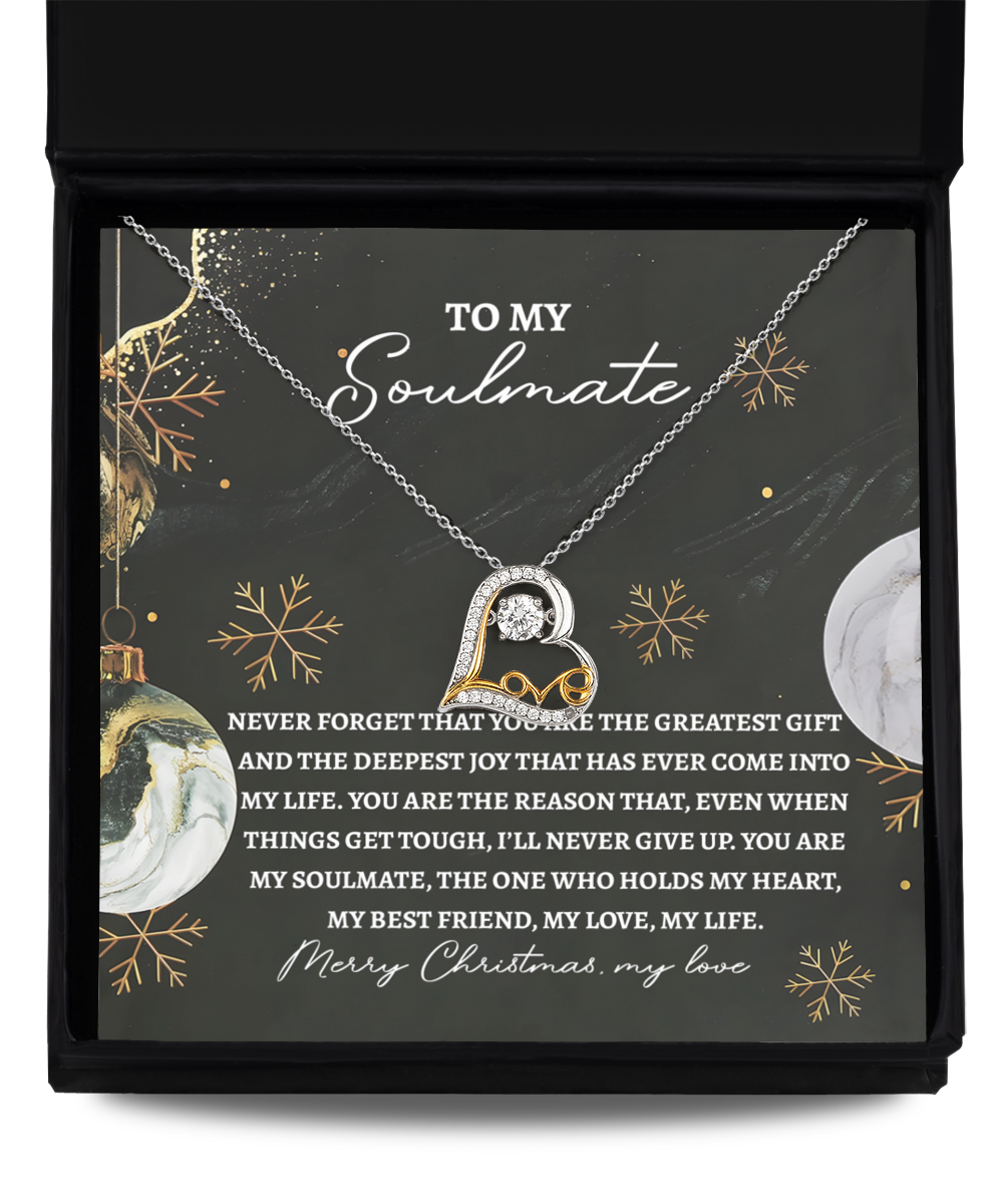 The Soulmate-Greatest Gift - Love Dancing Necklace is beautifully crafted from sterling silver and showcases a heart and cubic zirconia crystal pendant. Presented in an elegant gift box, the lid conveys a heartfelt message to your soulmate for Christmas.