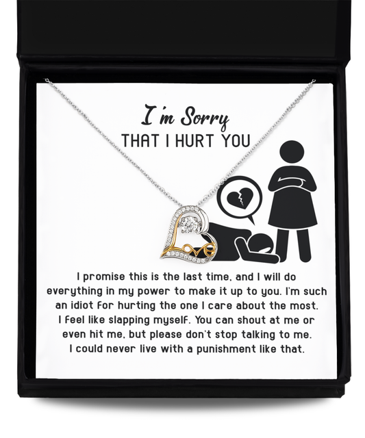 Introducing the Sorry-Stop Talking - Love Dancing Necklace: a beautifully crafted sterling silver necklace with a heart-shaped pendant, presented on an illustrated white card featuring charming stick figures. The card carries a heartfelt apology message for any mistakes made and expresses a commitment to making amends, all elegantly packaged in a sleek black box—an ideal gift to show your sincerest sentiments.