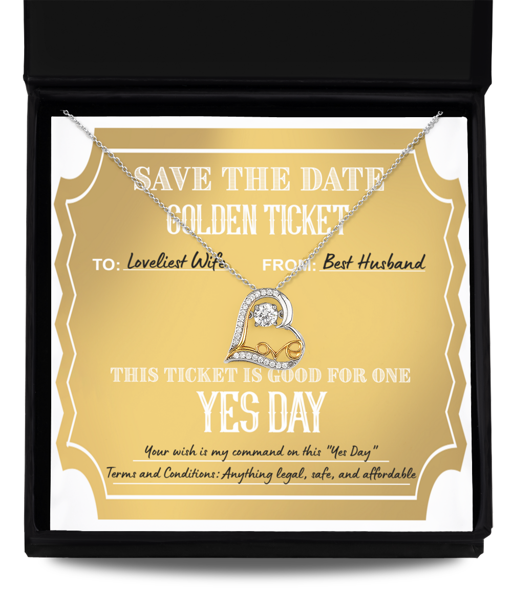 A "To Wife-Golden Ticket - Love Dancing Necklace" in a gift box on top of a golden ticket reading: "Save the Date. Golden Ticket. To: Loveliest Wife, From: Best Husband. This 14k gold plated ticket is good for one Yes Day.