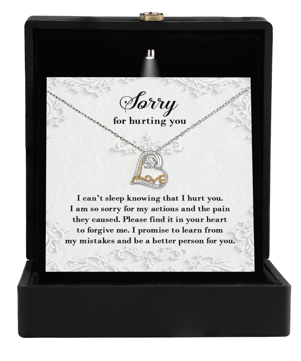 The Sorry-Can't Sleep - Love Dancing Necklace, featuring a heart-shaped pendant, comes in a box with an apology note expressing sincere regret and a promise to improve—a perfect gift for your wife.