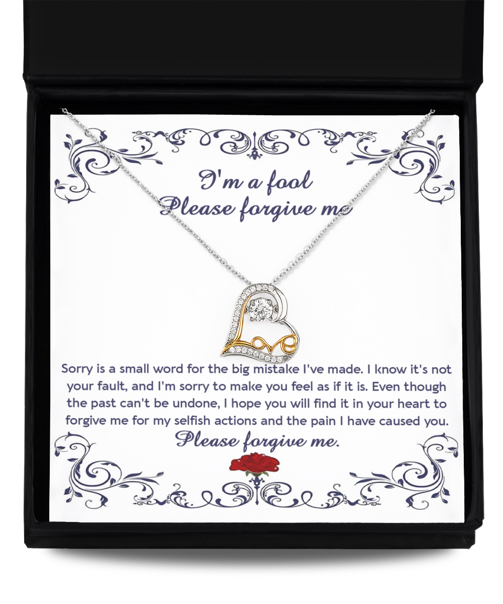 The "Sorry-I'm A Fool - Love Dancing Necklace" features a sterling silver chain with a heart-shaped pendant, elegantly presented in a box that includes an apology letter reading, "I'm a fool. Please forgive me," accompanied by an apologetic message and a rose illustration.