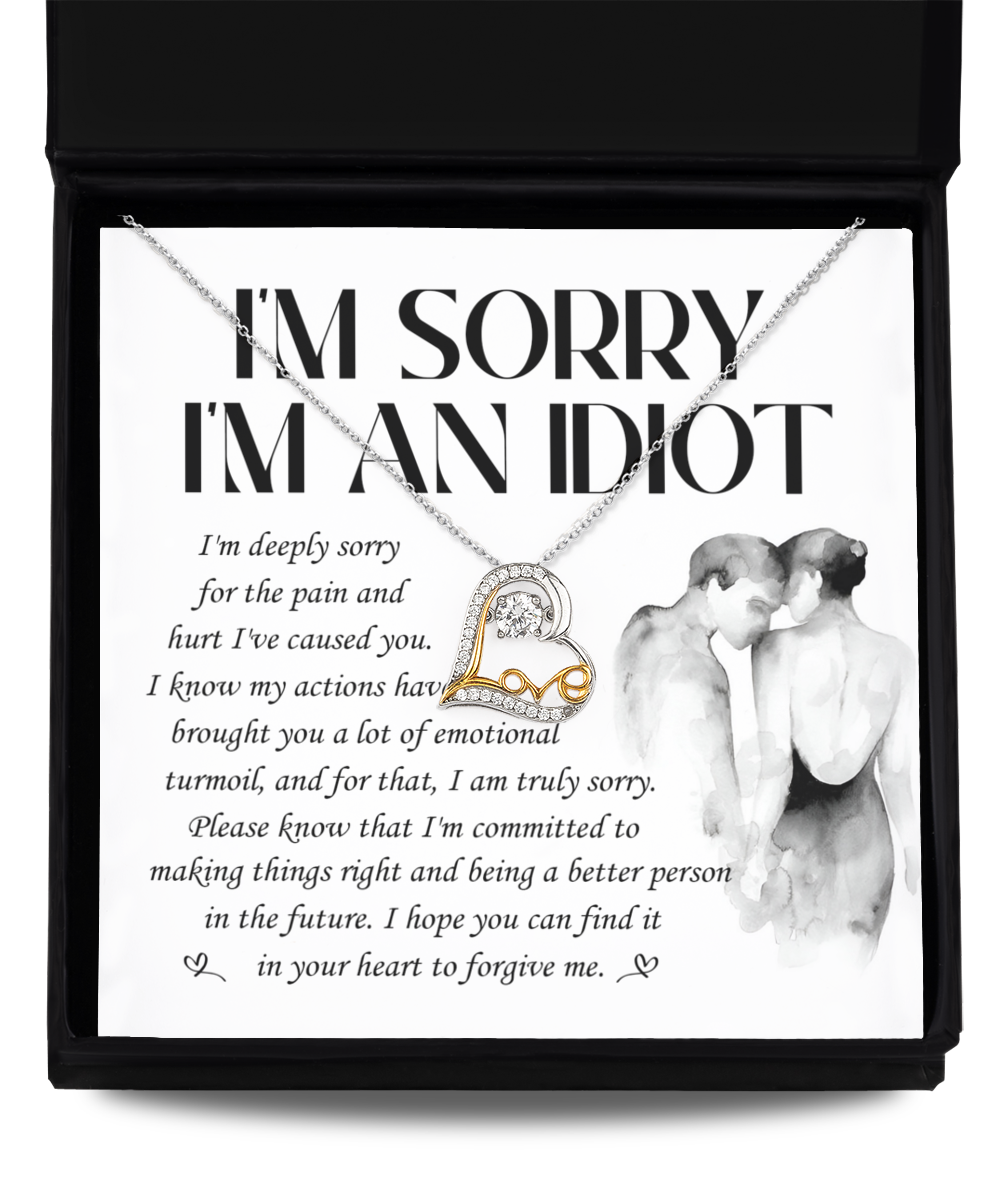 The "Sorry-Emotional Turmoil - Love Dancing Necklace," a .925 Sterling Silver necklace featuring a heart-shaped pendant, is showcased above a note that reads, "I'm Sorry I'm An Idiot," alongside an apology message expressing regret and seeking forgiveness.