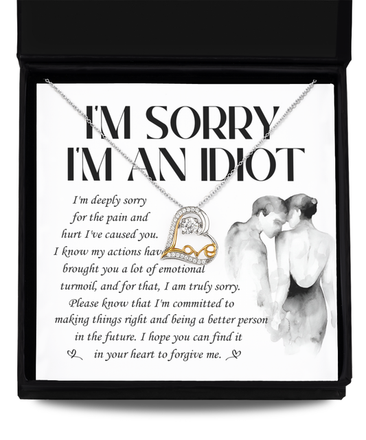 The "Sorry-Emotional Turmoil - Love Dancing Necklace," a .925 Sterling Silver necklace featuring a heart-shaped pendant, is showcased above a note that reads, "I'm Sorry I'm An Idiot," alongside an apology message expressing regret and seeking forgiveness.