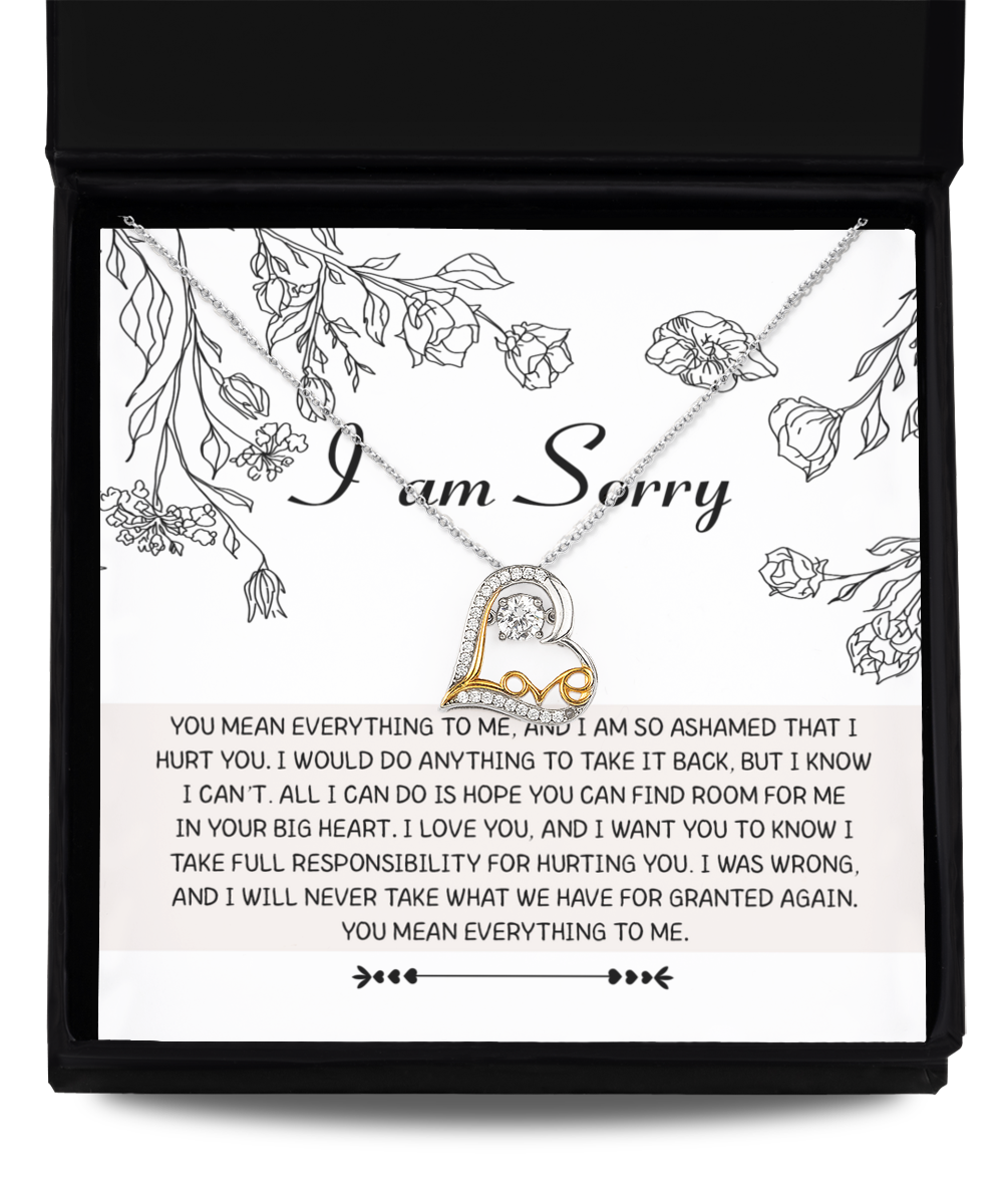 The "Sorry-Your Big Heart - Love Dancing Necklace" is a sterling silver necklace featuring a heart-shaped pendant, beautifully packaged in a box that includes a heartfelt note with an apology and expressions of love.