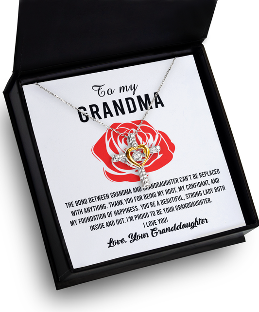 A "To Grandma, Strong Lady - Cross Dancing Necklace" in a gift box with a heartfelt message from a granddaughter to her grandmother by Gearbubble.