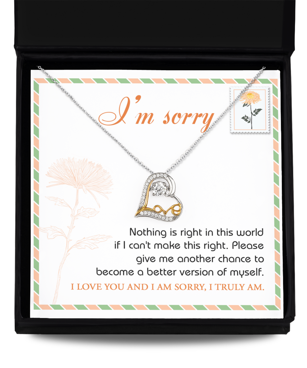 The Sorry-Another Chance - Love Dancing Necklace, featuring a heart pendant and crafted from .925 Sterling Silver, is displayed in a box that includes an apology and a heartfelt request for another chance to make things right.