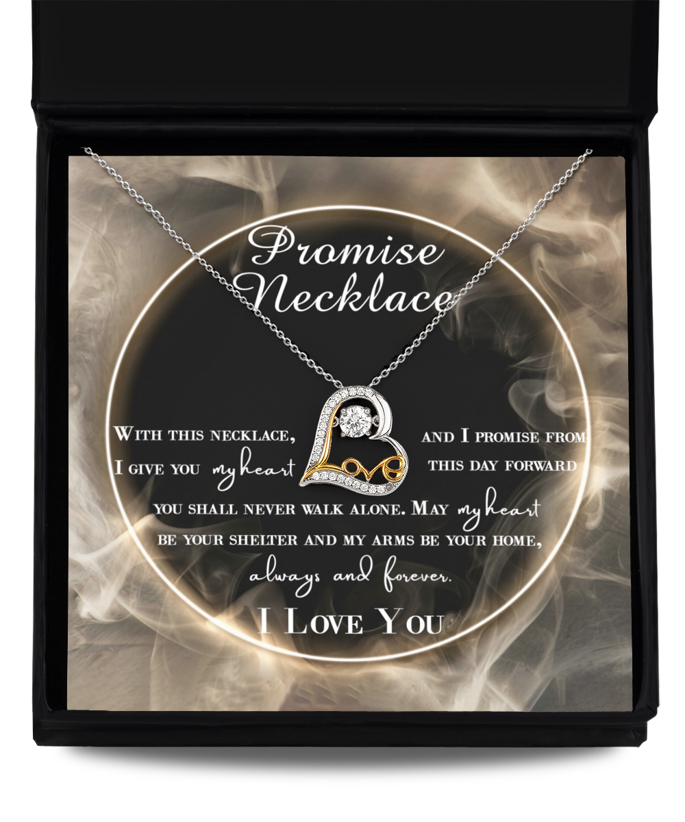 A To Wife, Promise Necklace - Love Dancing Necklace featuring a heart-shaped pendant with a diamond in the center is displayed inside a black box with a heartfelt promise message.