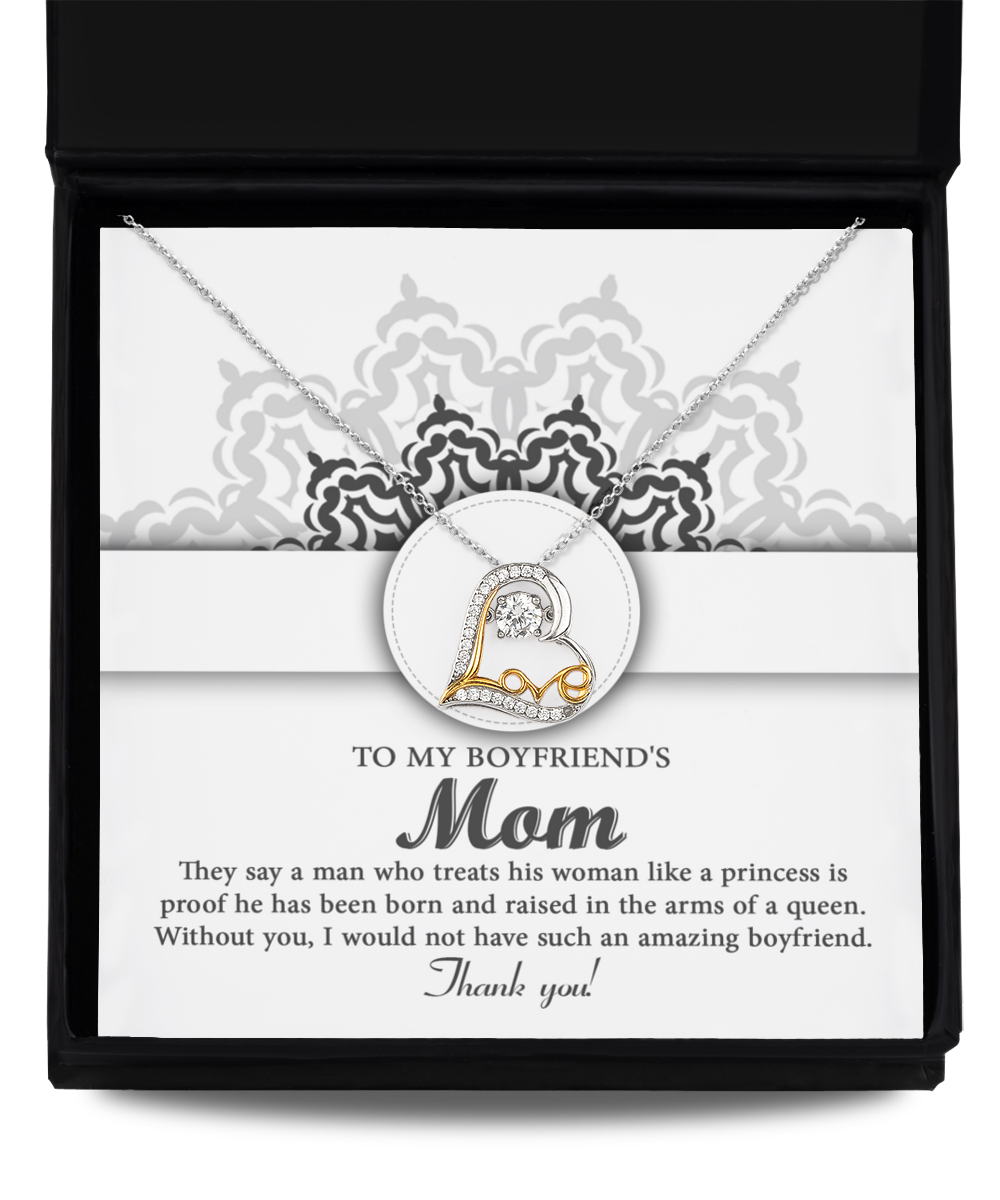 Silver and gold heart-shaped "To Boyfriend's Mom, In The Arms - Love Dancing Necklace" with a 14k gold pendant, presented in a box along with a heartfelt message expressing gratitude to a boyfriend's mother. Perfect as a Mother's Day gift or simply to show appreciation for all her love.