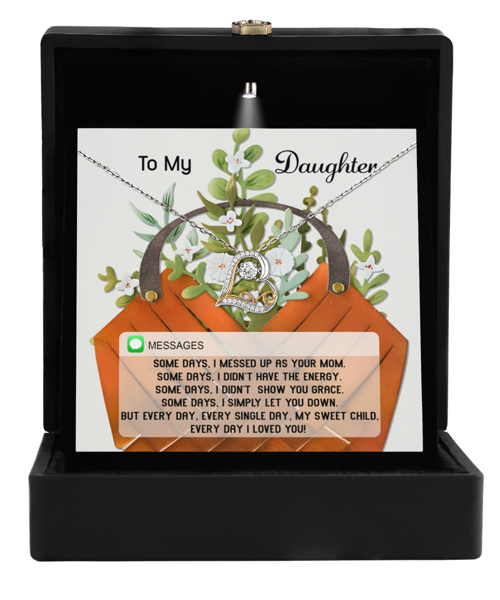 The Daughter-Show You Grace - Love Dancing Necklace, presented in a black box with a heart and infinity symbol, is crafted from sterling silver and comes with a heartfelt message to a daughter.