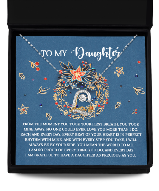 A Daughter-Perfect Rhythm - Love Dancing Necklace set in a box with a heartfelt message to a daughter, featuring vibrant floral designs and tiny gems, crafted from beautiful Sterling Silver.