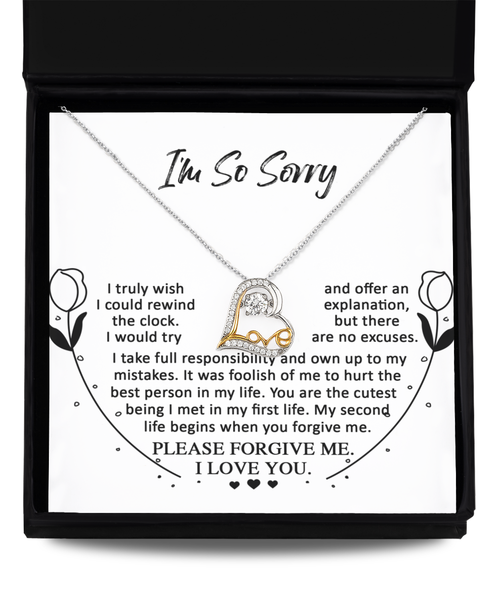 Introducing the "Sorry-My First Life - Love Dancing Necklace," a sterling silver heart pendant, elegantly presented in a gift box. The accompanying note reads: "I'm So Sorry. I truly wish I could rewind the clock..." and ends with "Please forgive me. I love you.