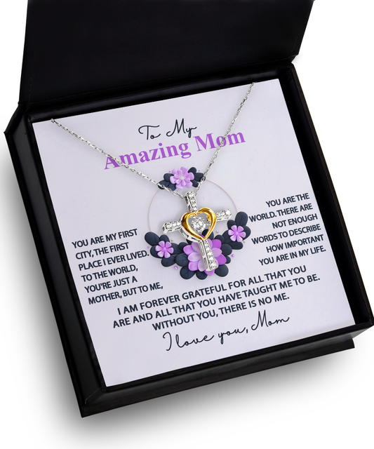 A To Mom, Forever Grateful - Cross Dancing Necklace in a box with a message to "my amazing mom," featuring floral designs and a heartfelt note from a child to their mother.