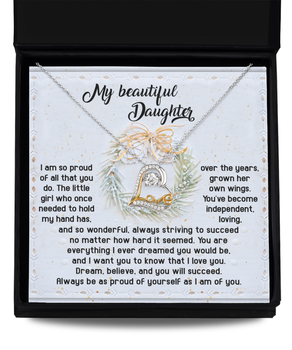 The Daughter-Proud Of Yourself - Love Dancing Necklace, available in 14k gold or sterling silver, comes in a gift box with a sentimental message for a daughter. It beautifully conveys love, pride, and encouragement for her independence and success.